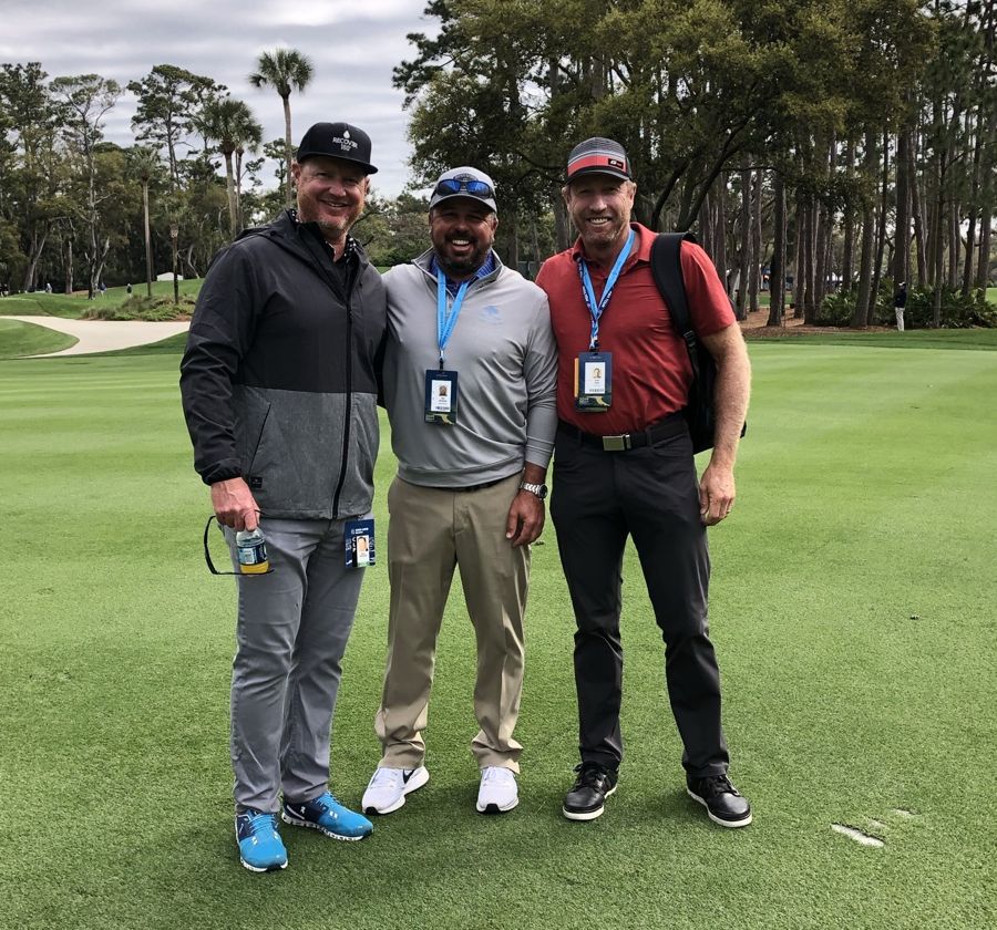 DMAC with two players at TPC Sawgrass